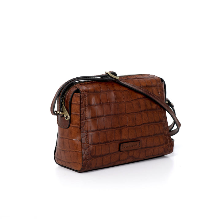 Brown leather handbag with a crocodile texture and a single shoulder strap