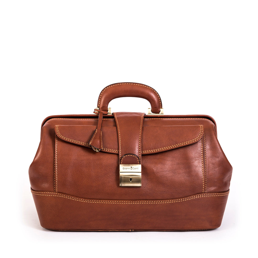 Brown leather handbag with buckle clasp and handle