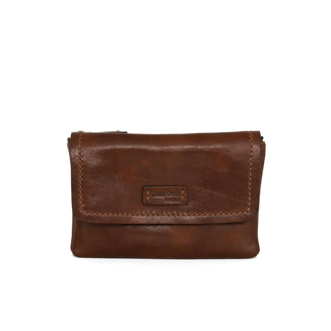 Brown leather clutch bag with brand logo on front flap