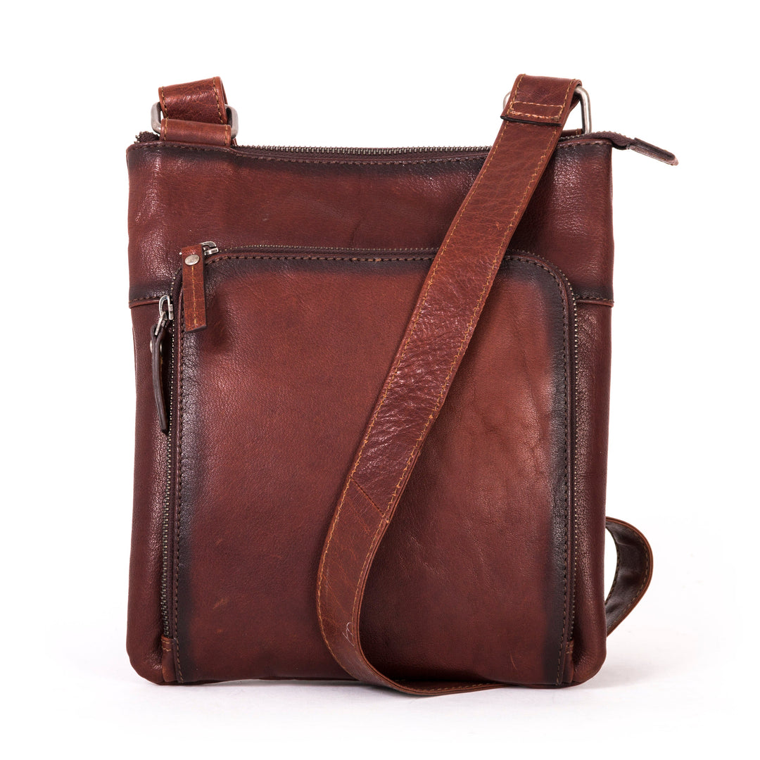Brown leather crossbody bag with front zipper pocket