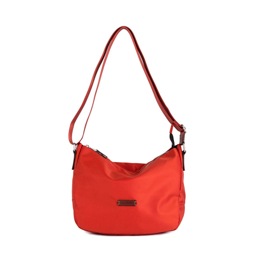 Red shoulder bag with adjustable strap and zip closure