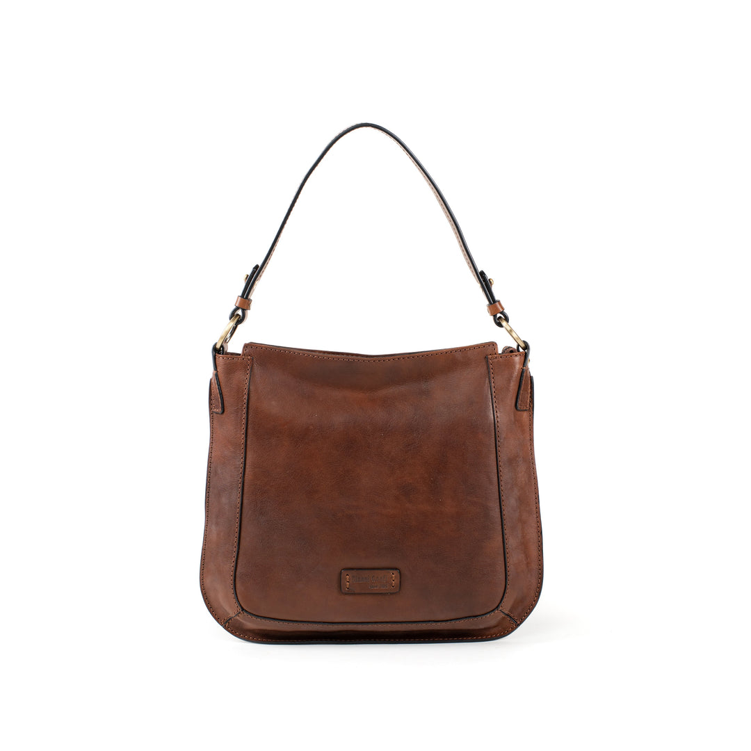 Brown leather handbag with a single shoulder strap and minimalist design