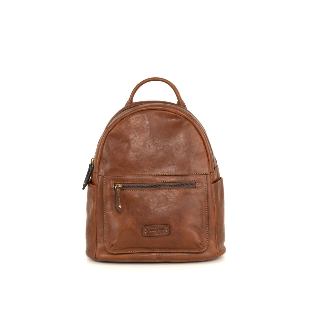 Brown leather backpack with front zipper pocket and top handle against white background