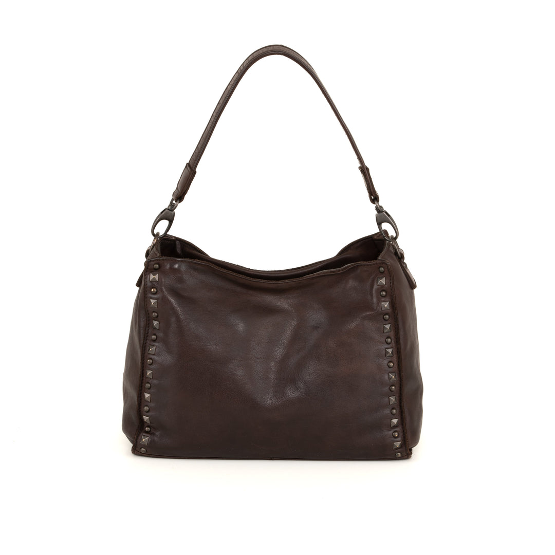 Dark brown leather handbag with metal stud accents and a top handle