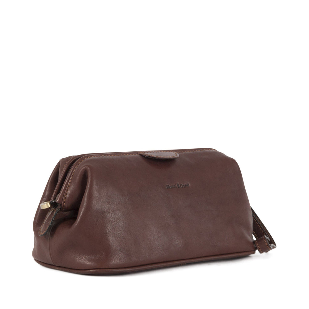 Brown leather toiletry bag with zipper closure