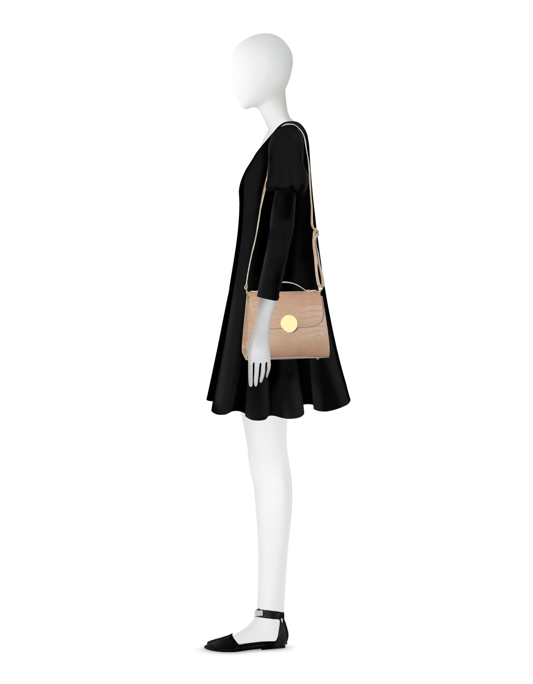 Side view of mannequin in a black dress holding a beige shoulder bag