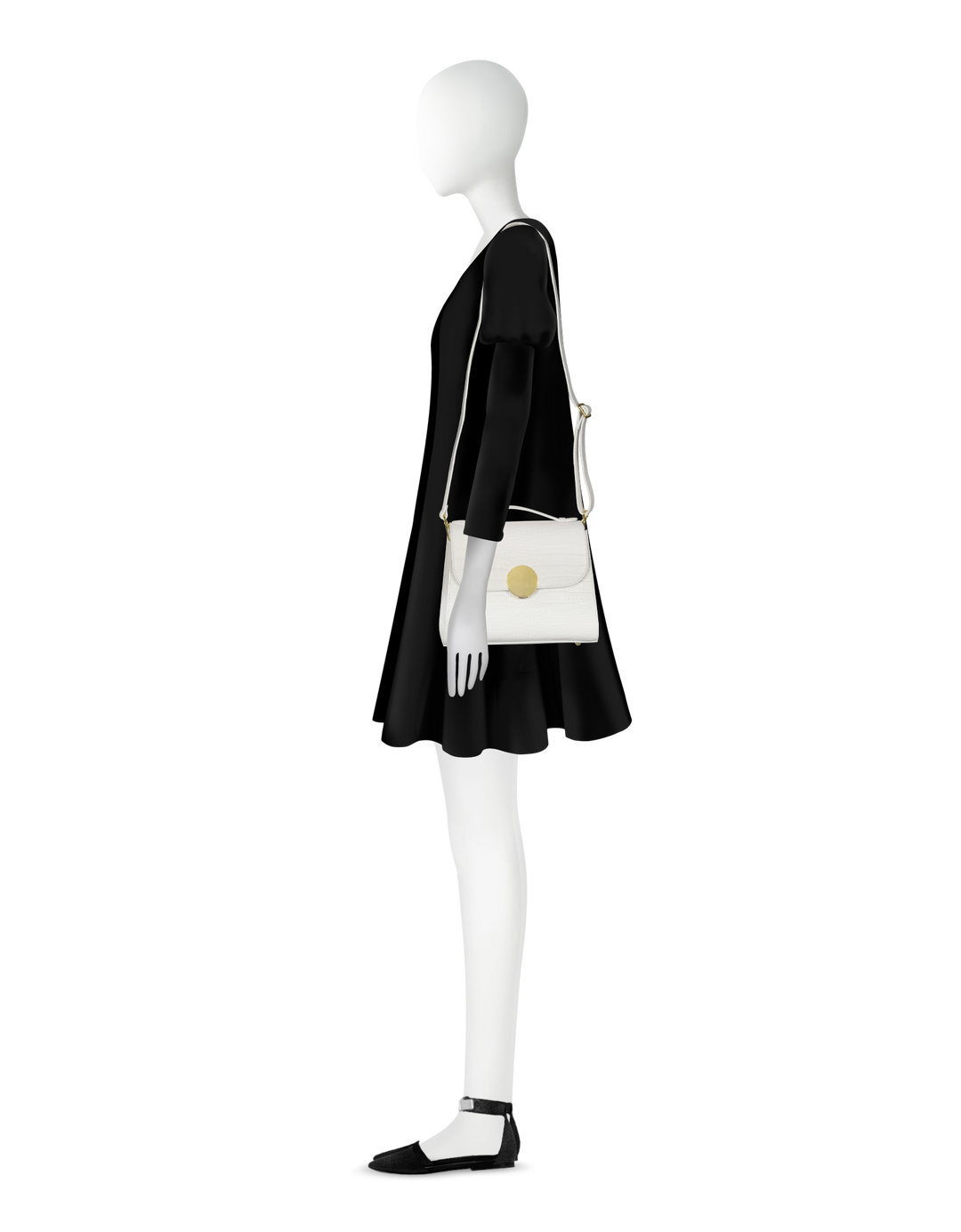 Side profile of mannequin wearing a black dress with a white handbag