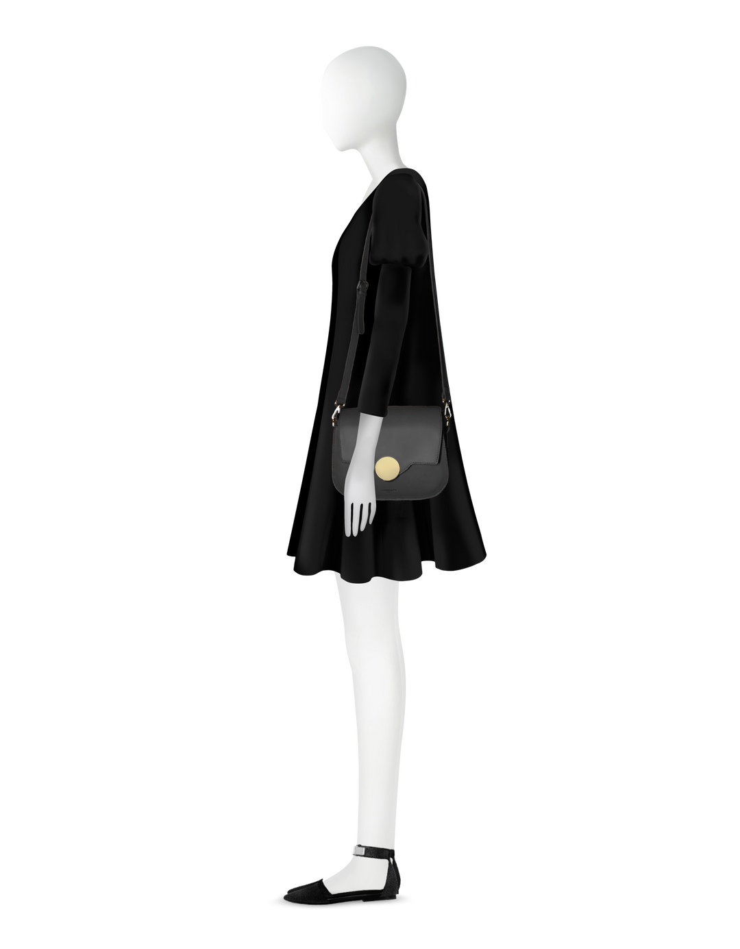 Side view of mannequin wearing black dress with matching handbag and shoes