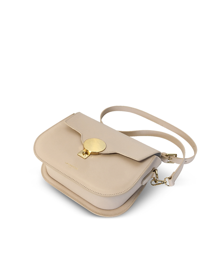 Beige leather handbag with gold clasp and adjustable strap