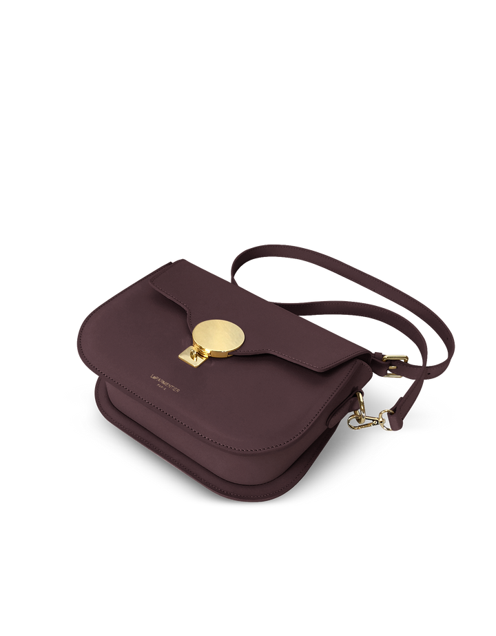 Burgundy leather crossbody bag with gold clasp and adjustable strap