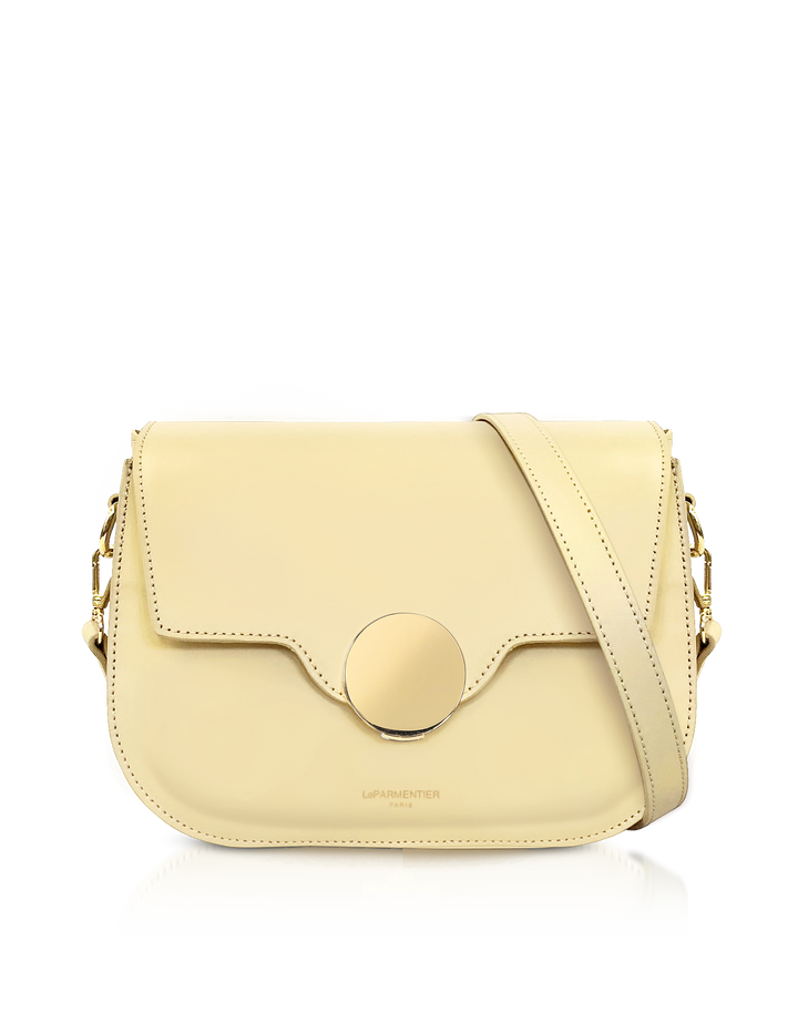 Cream-colored leather shoulder bag with gold accents