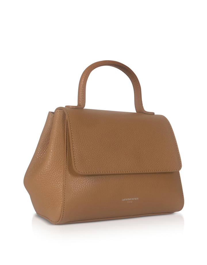 Tan leather handbag with handle and flap closure