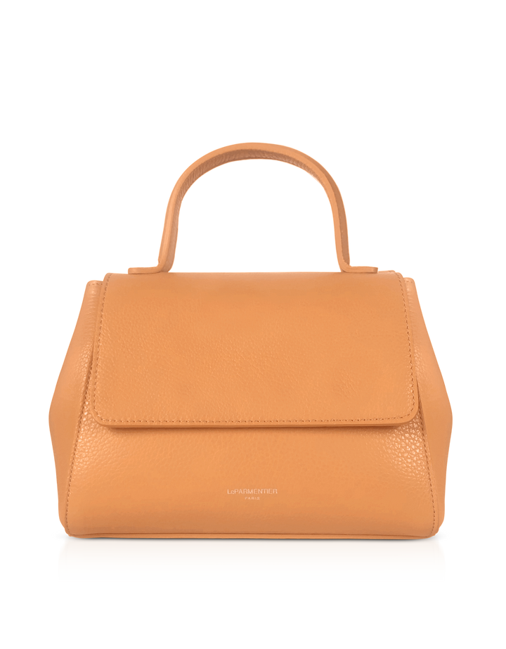 Light brown leather handbag with top handle against orange background