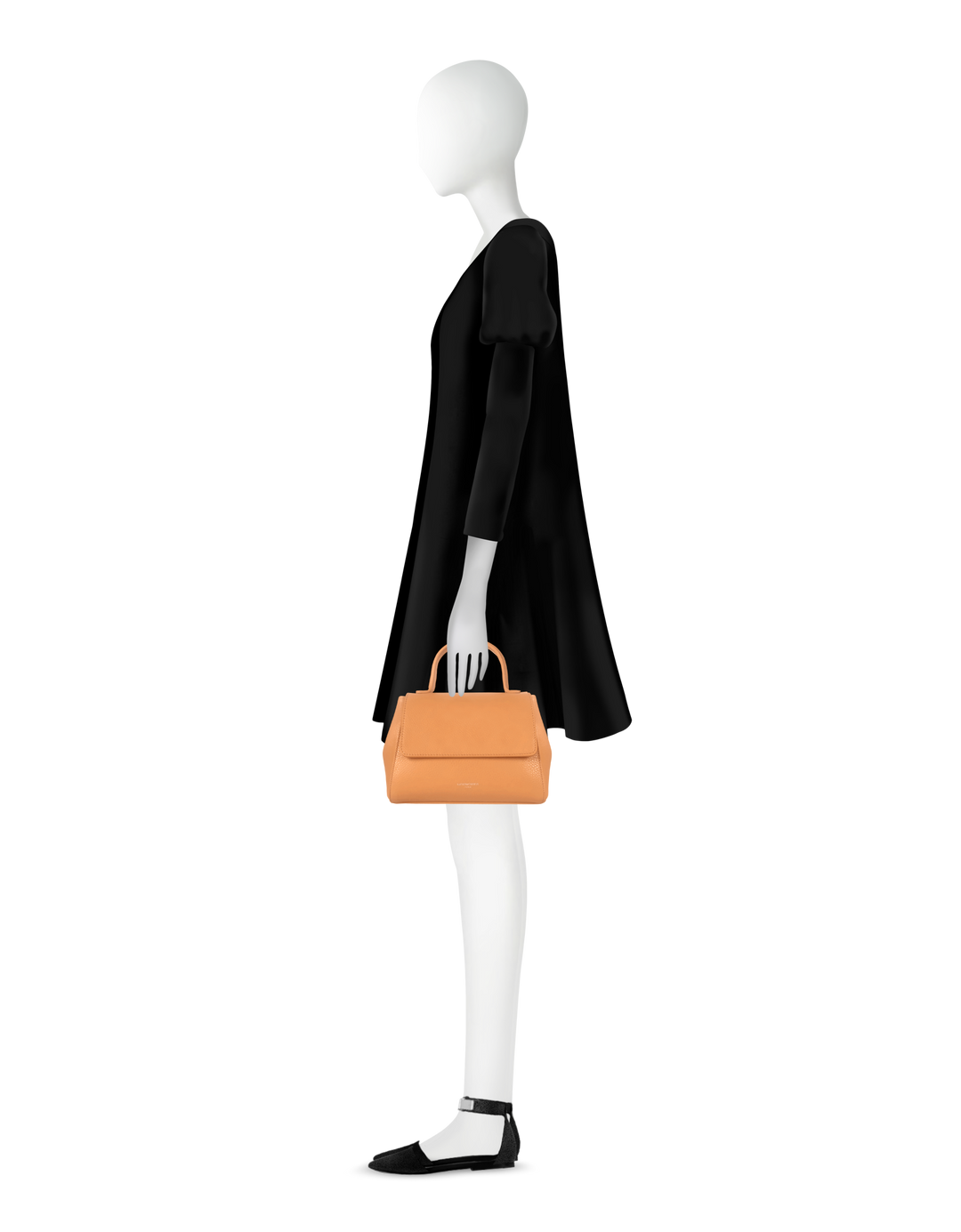 Silhouette of a mannequin in a black dress holding a stylish orange handbag