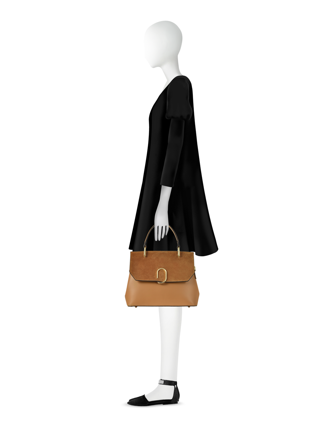 Side view of mannequin in black dress holding brown handbag
