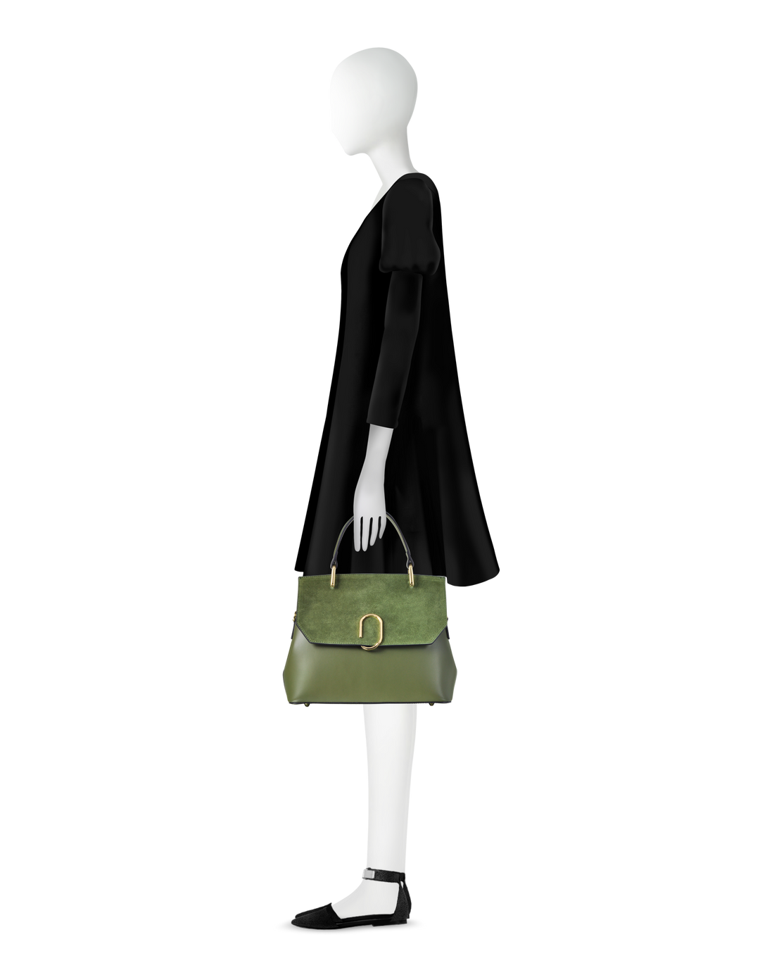 Side view of mannequin in black dress holding green handbag