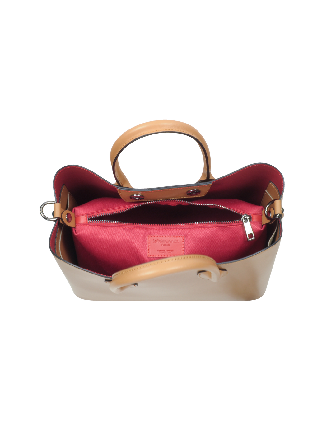 Open tan leather handbag with red interior and handle, displaying a zippered pocket