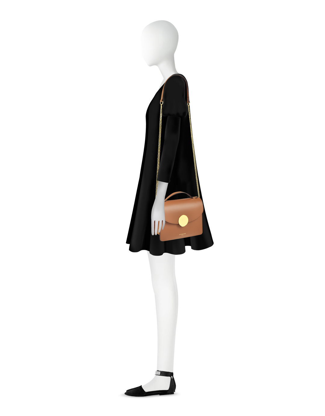 Side view of mannequin wearing black dress and carrying brown handbag