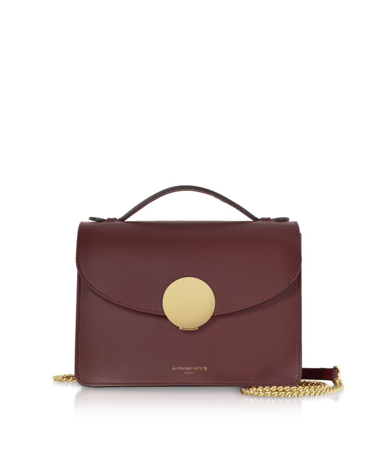 Luxury maroon leather handbag with gold chain strap and circular claspè°ƒæ•´åŽçš„æ–‡æœ¬