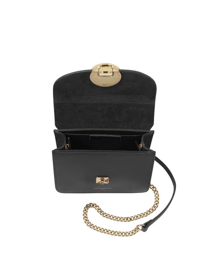 Black leather handbag with gold chain and clasp, open view