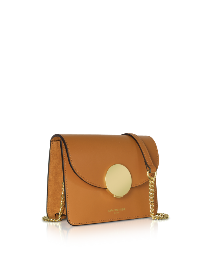 Elegant brown leather handbag with gold chain and circular clasp