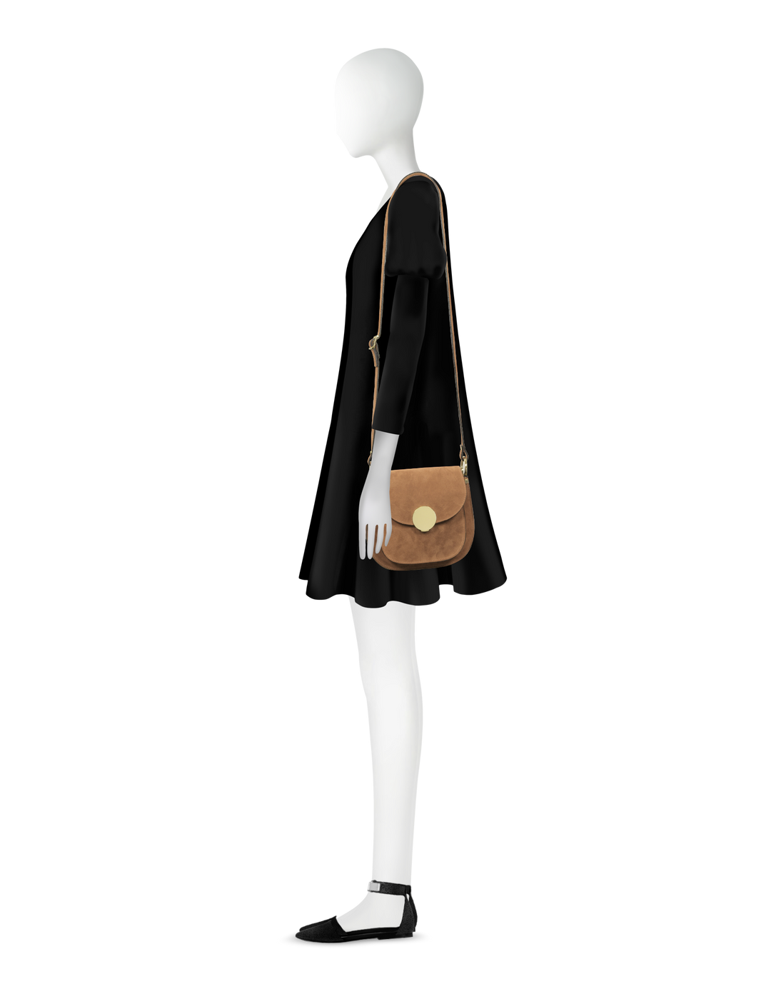 Person modeling black dress and brown crossbody bag