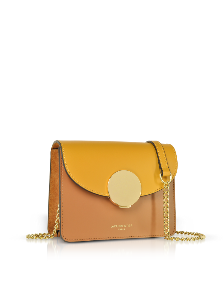 Two-tone leather handbag with gold chain and clasp