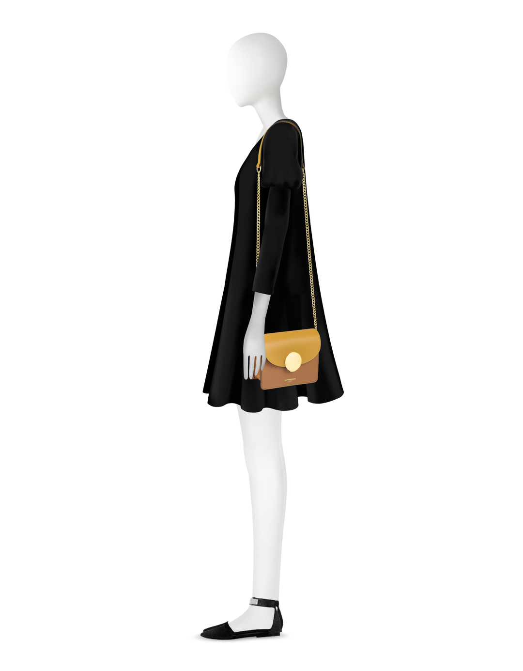 Profile of mannequin showcasing a black dress with a beige shoulder bag