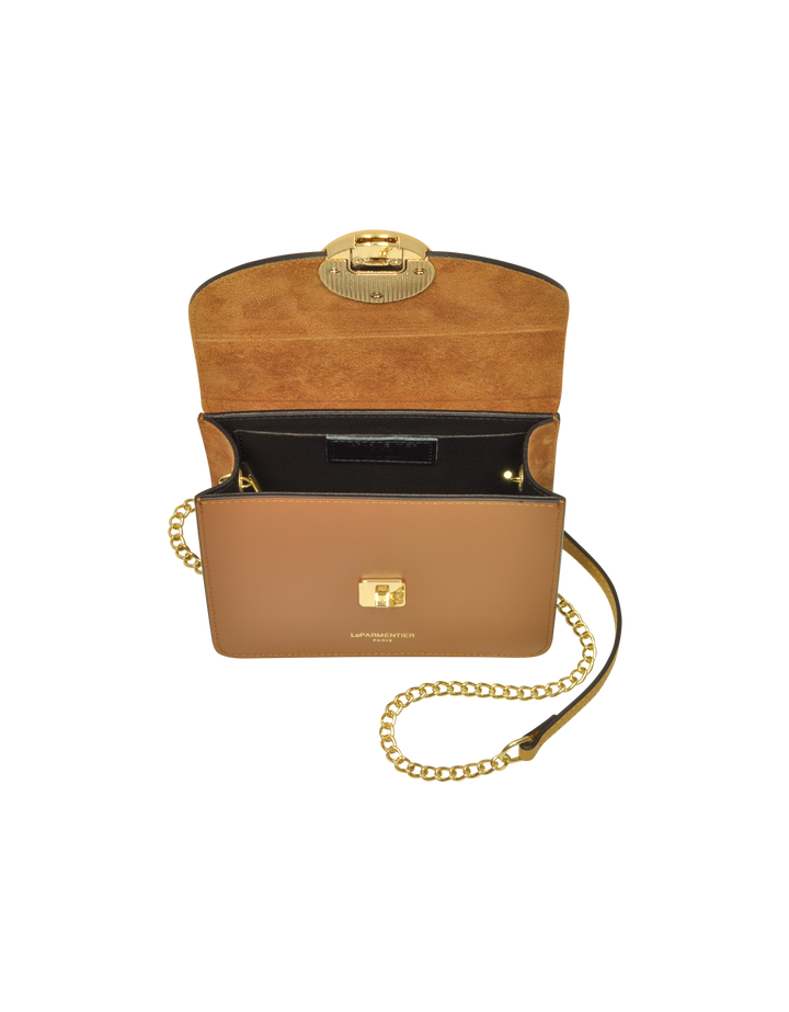 tan leather crossbody bag with gold chain and clasp, open to reveal interior pockets