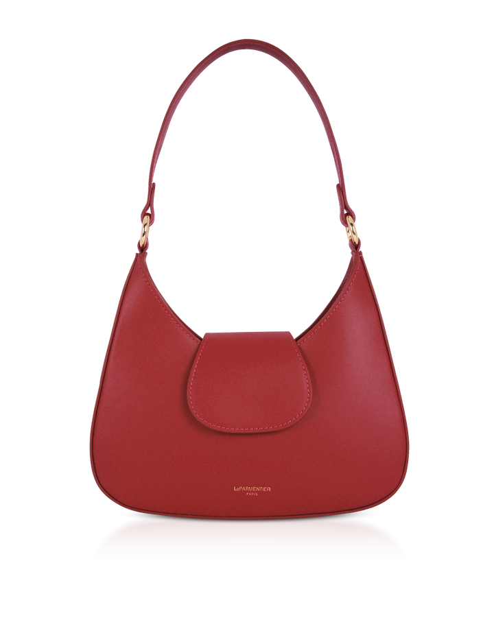 Red leather handbag with gold hardware and a top handle