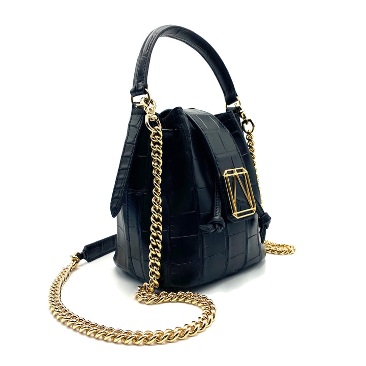 Luxurious black designer handbag with gold chain strap and buckle