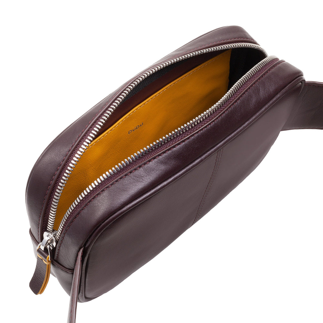 Brown leather crossbody bag with open zipper showing orange interior