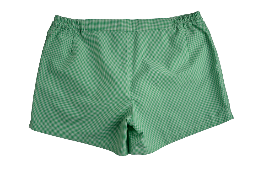 Green men's shorts with a subtle striped pattern, displayed on a white background