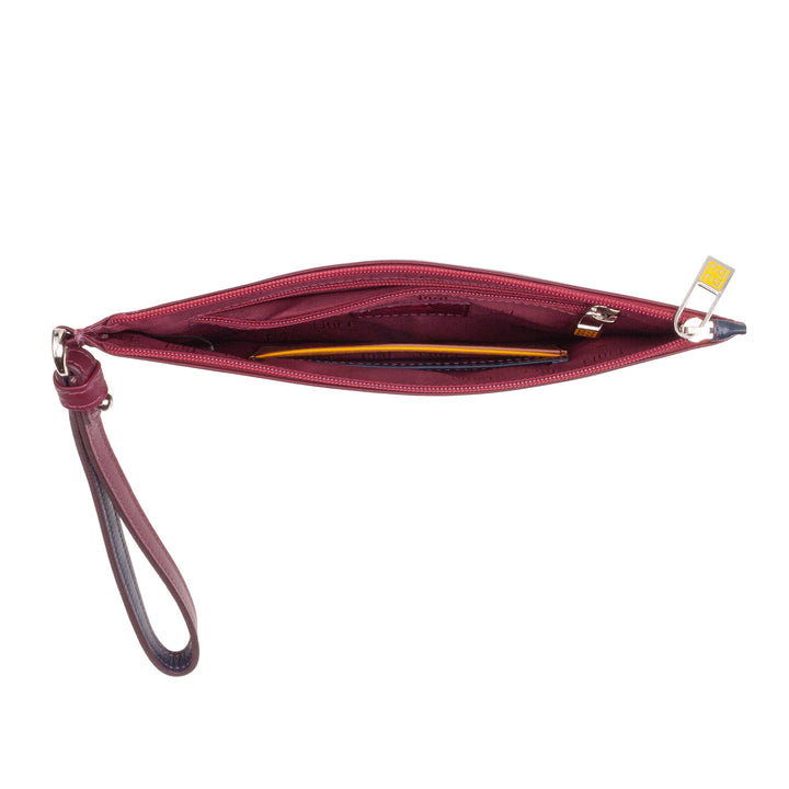 Open red leather wristlet showing compartments and contents