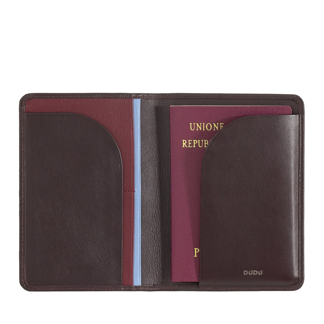 Brown leather passport holder with multiple compartments containing two passports