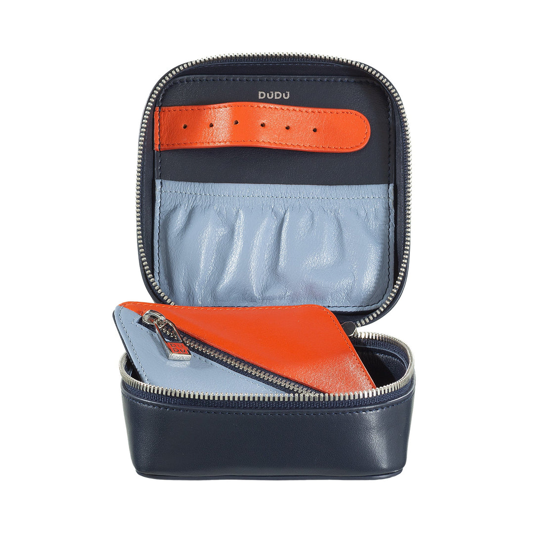 Leather travel case with multiple compartments and contrasting blue, orange, and gray colors