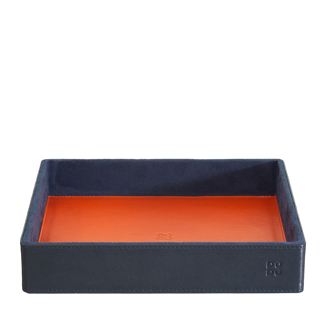 Navy blue leather valet tray with orange interior lining