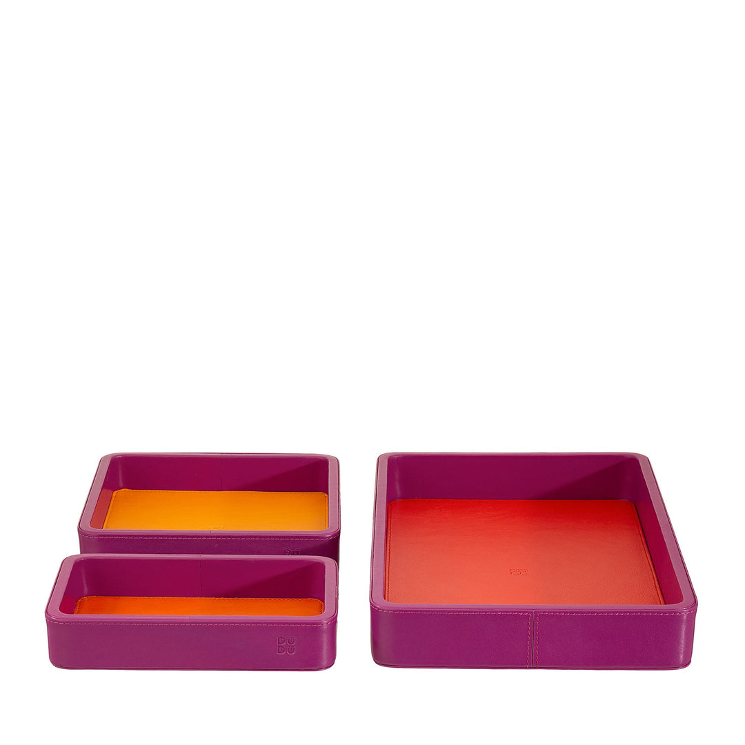 Set of three purple and orange leather storage trays