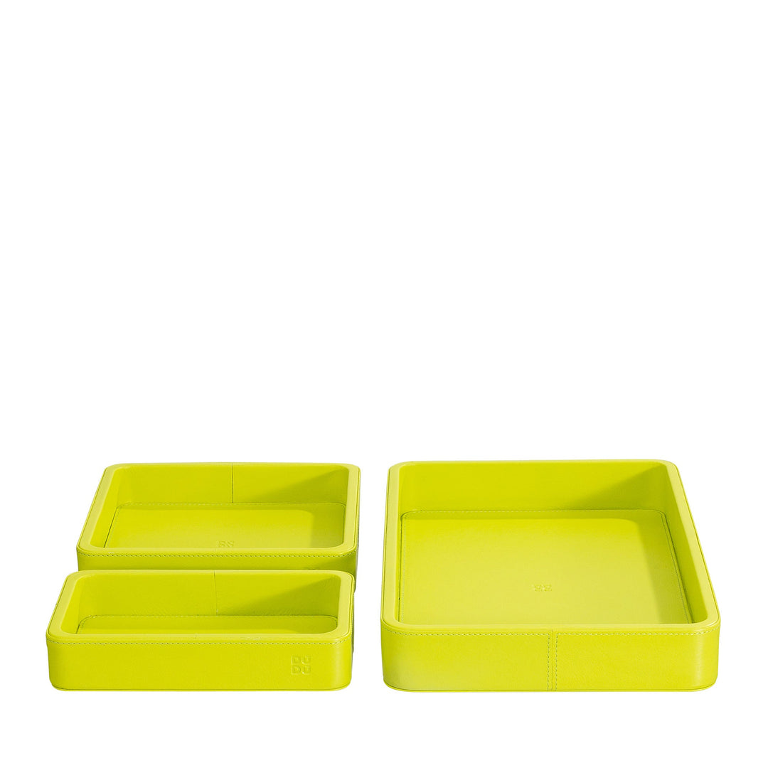 Set of bright yellow rectangular storage trays in different sizes
