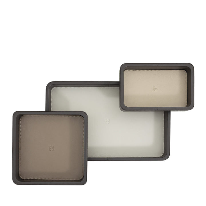 Set of three assorted rectangular storage trays in various sizes and neutral tones