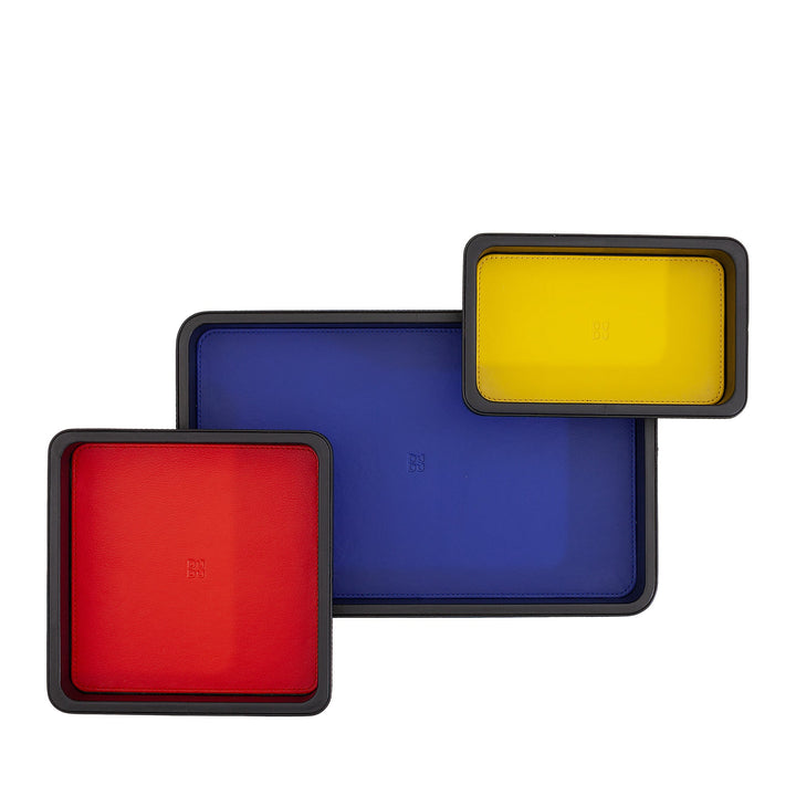 Colorful square trays in red, blue, and yellow nesting together