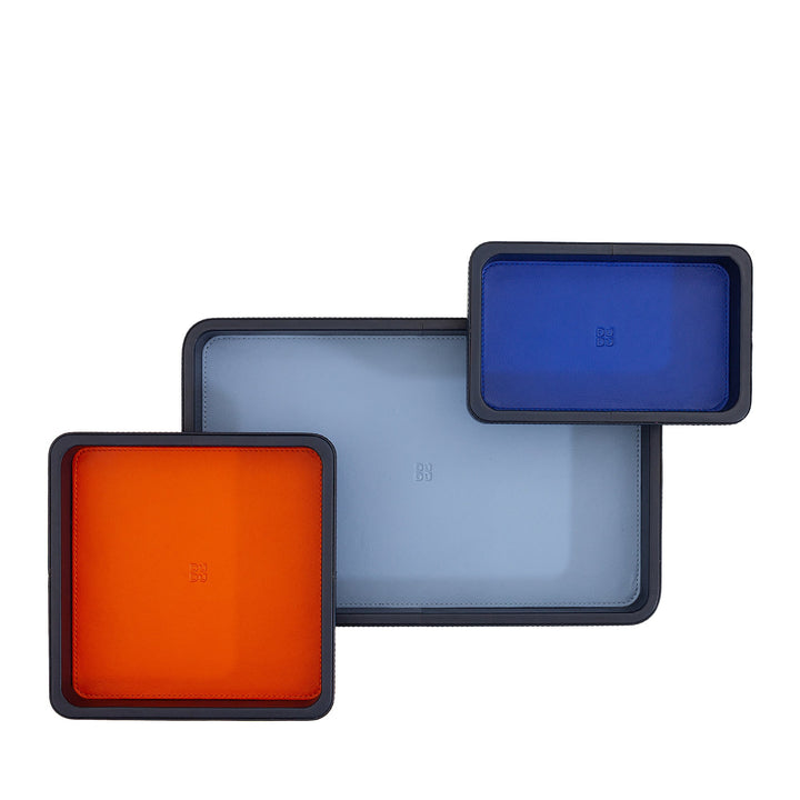 Colorful square trays in orange, blue, and light blue with minimalist design