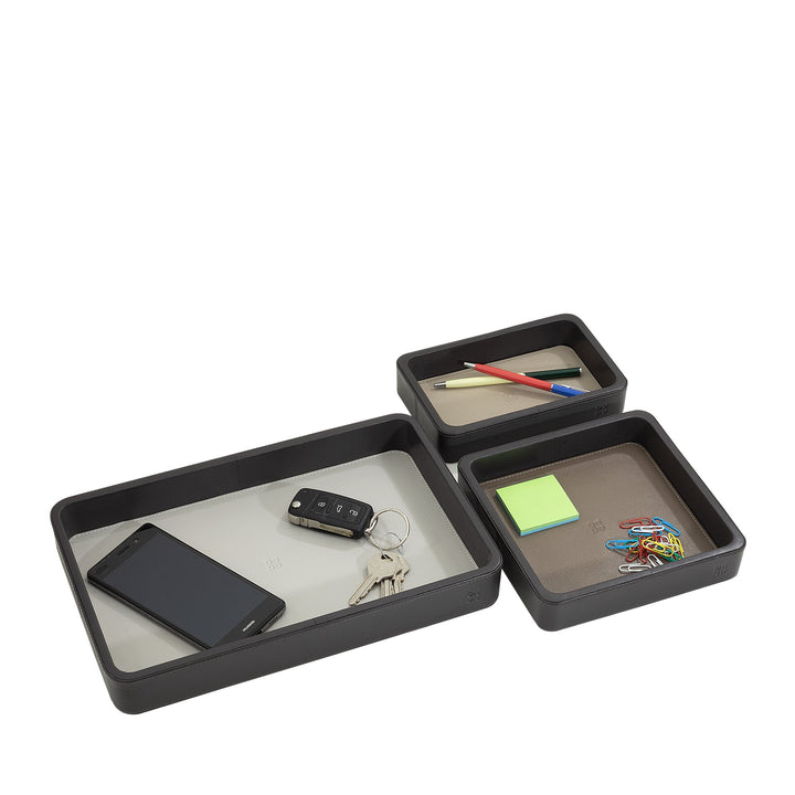 Desktop organizer trays with phone, keys, pencils, sticky notes, and paper clips