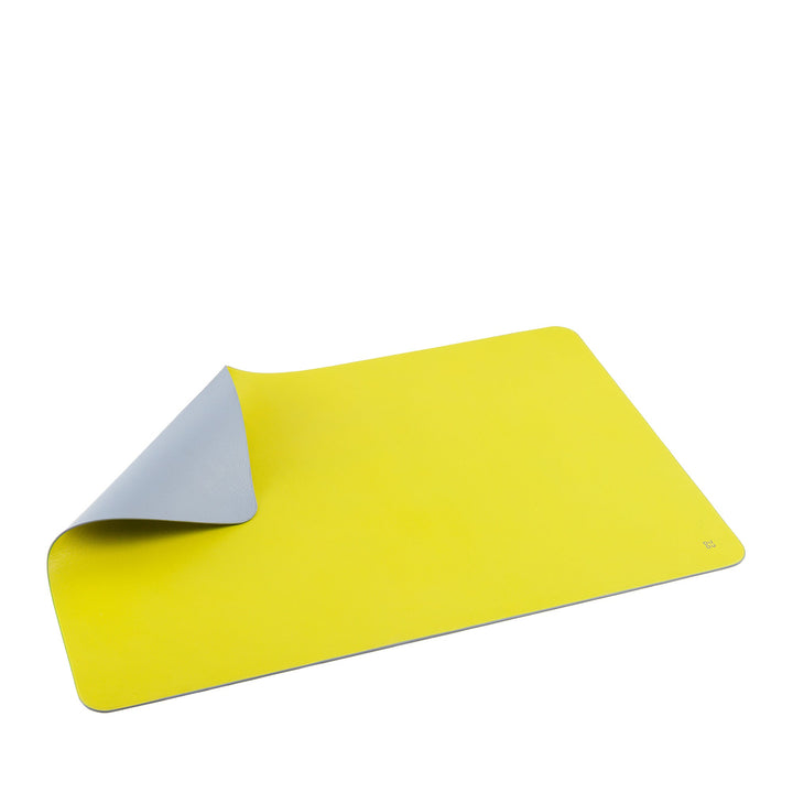 Dual-colored yoga mat with bright yellow top surface and grey underside