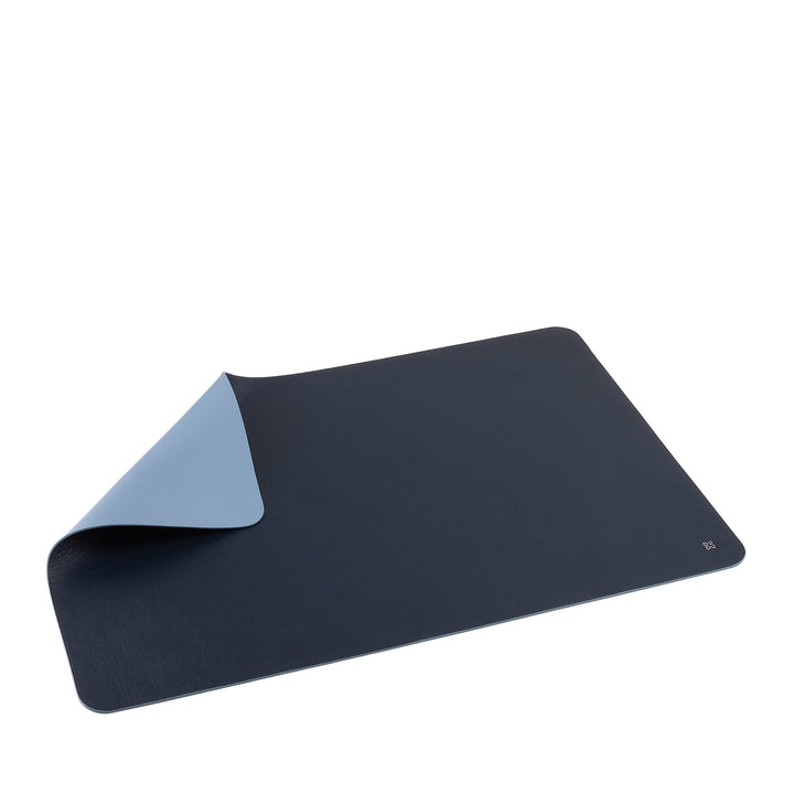 Reversible black and gray desk mat on a white background
