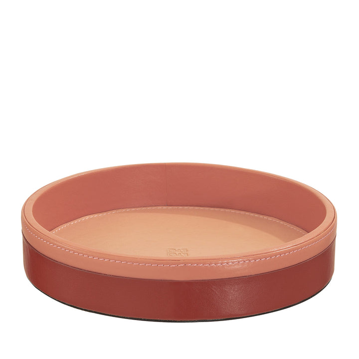 Circular leather tray in terracotta and peach tones