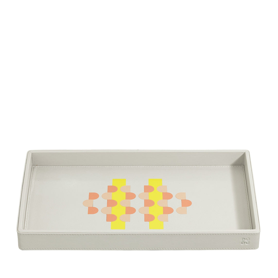 Rectangular white leather tray with geometric orange and yellow pattern