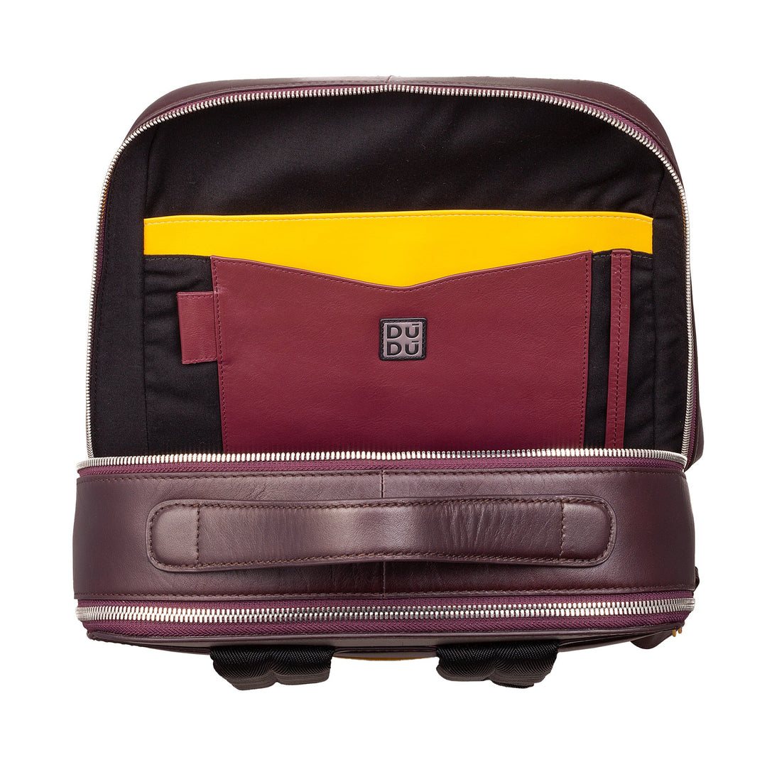 Open leather backpack with yellow and burgundy compartments, featuring DUDU branding