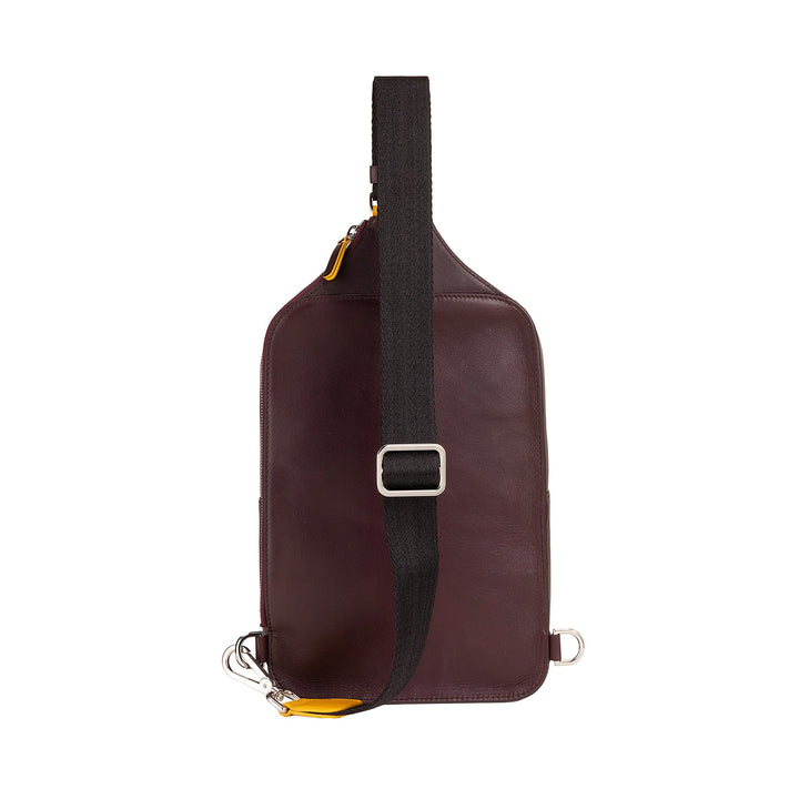 Brown leather crossbody sling bag with black adjustable strap