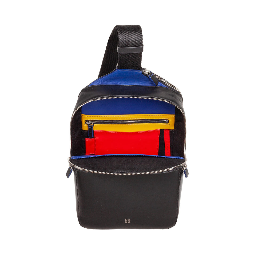 Modern black leather sling backpack with colorful interior pockets and zipper compartment